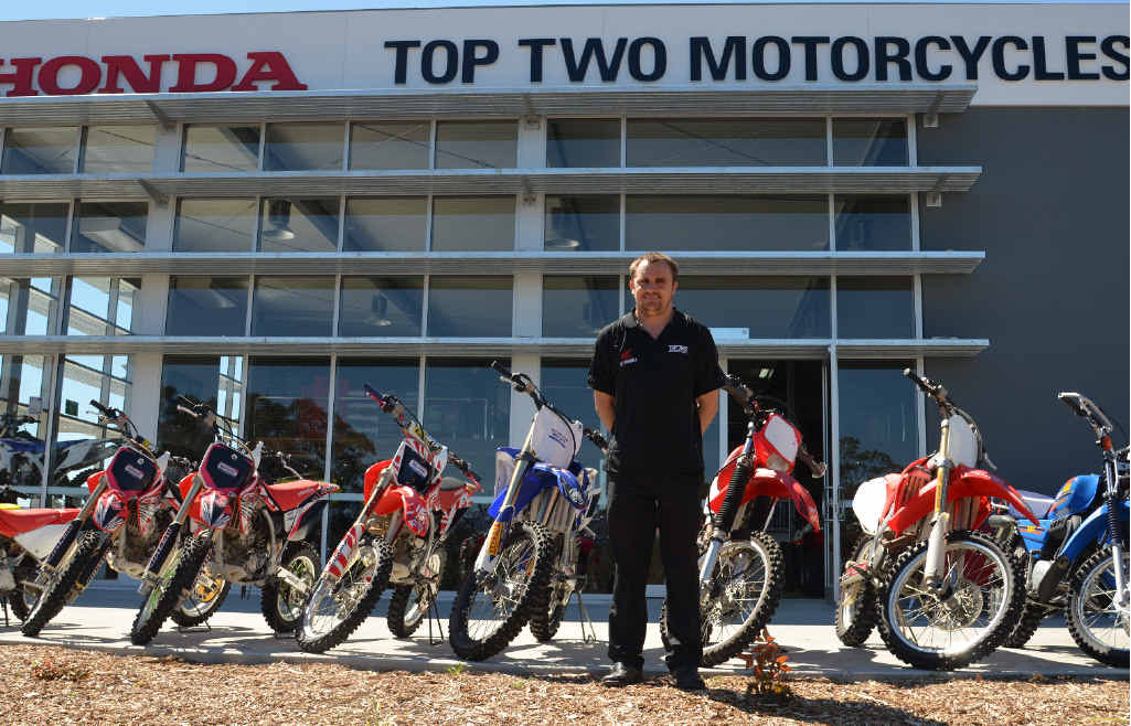 NEW DIGS: Top Two Motorcycles owner Peter Lippi out the front of his new store.
